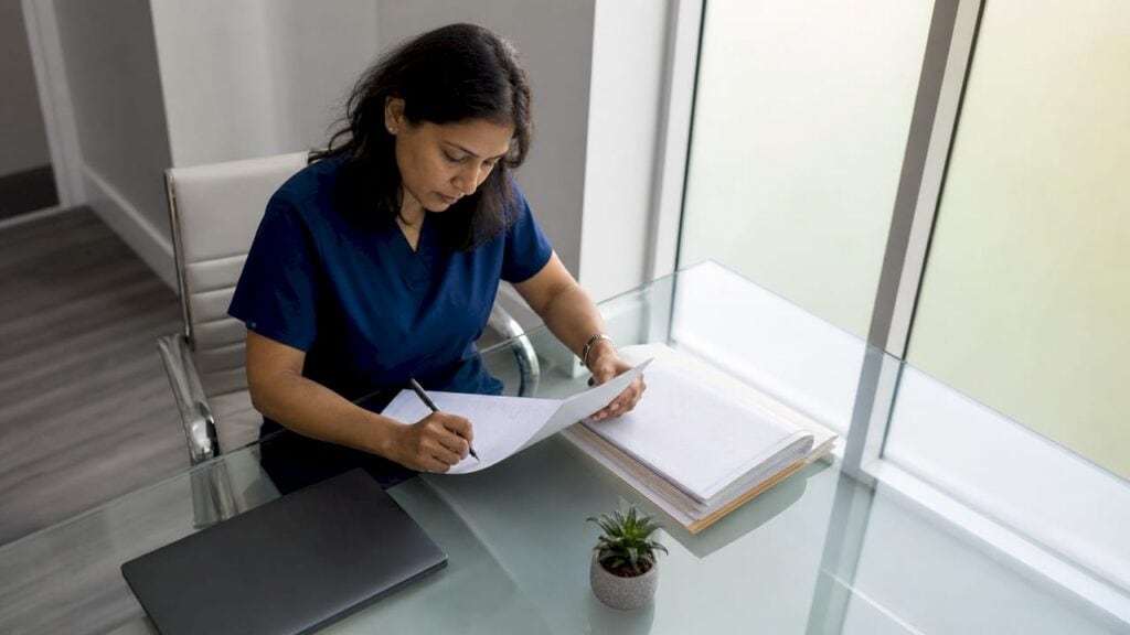 Physiatrist reviewing injury claim documents
